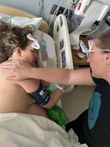 Doula comforting patient